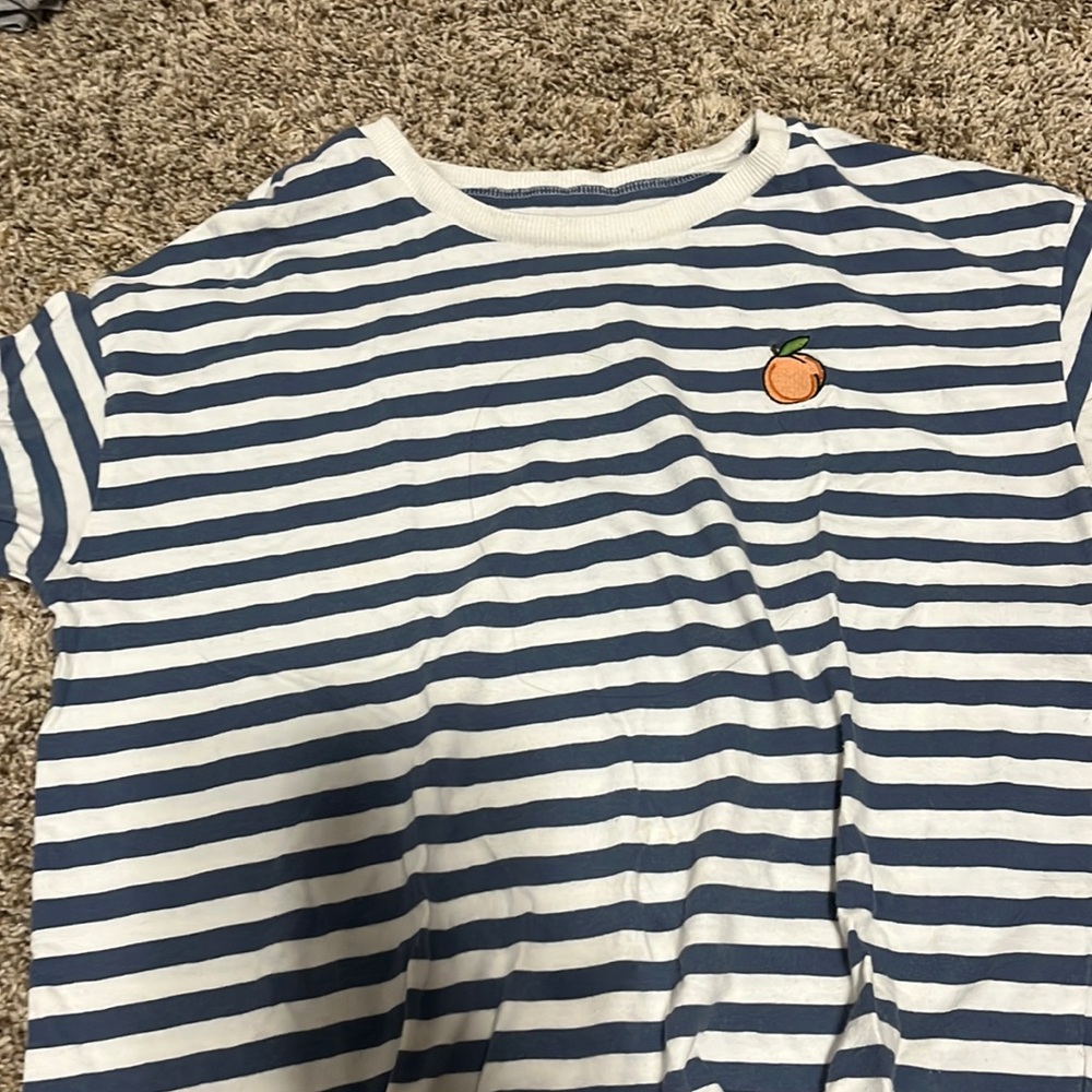 Orange print on stripe